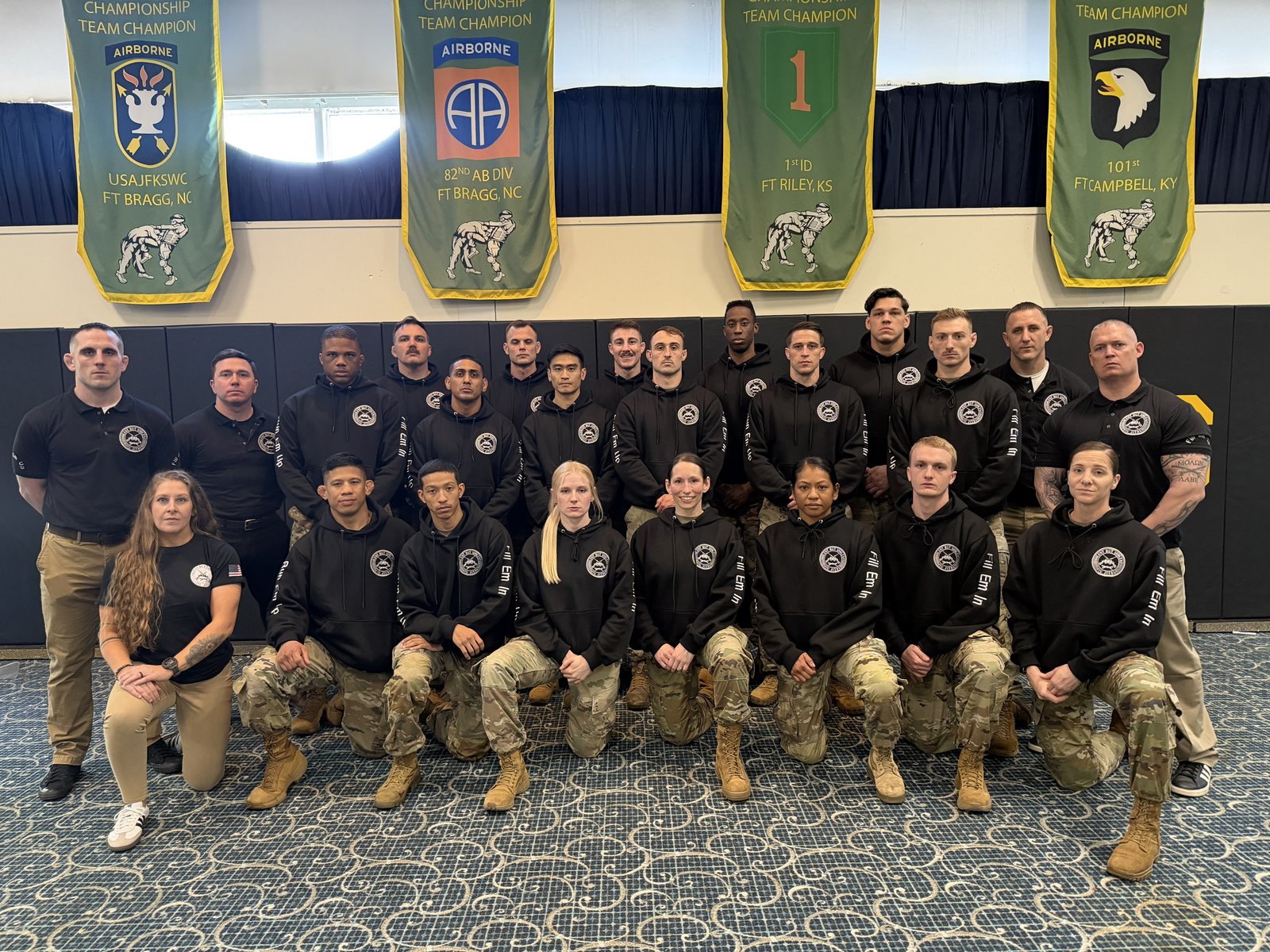 RCTA team photo — Airborne Championship banners, Fort Bragg